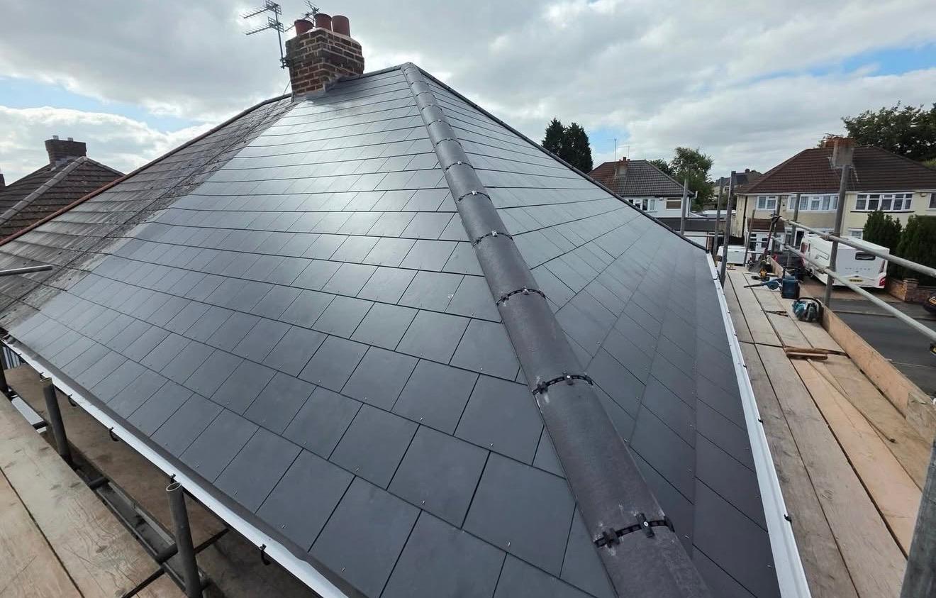 Finished slate roof with neatly aligned courses completed in the Colchester area