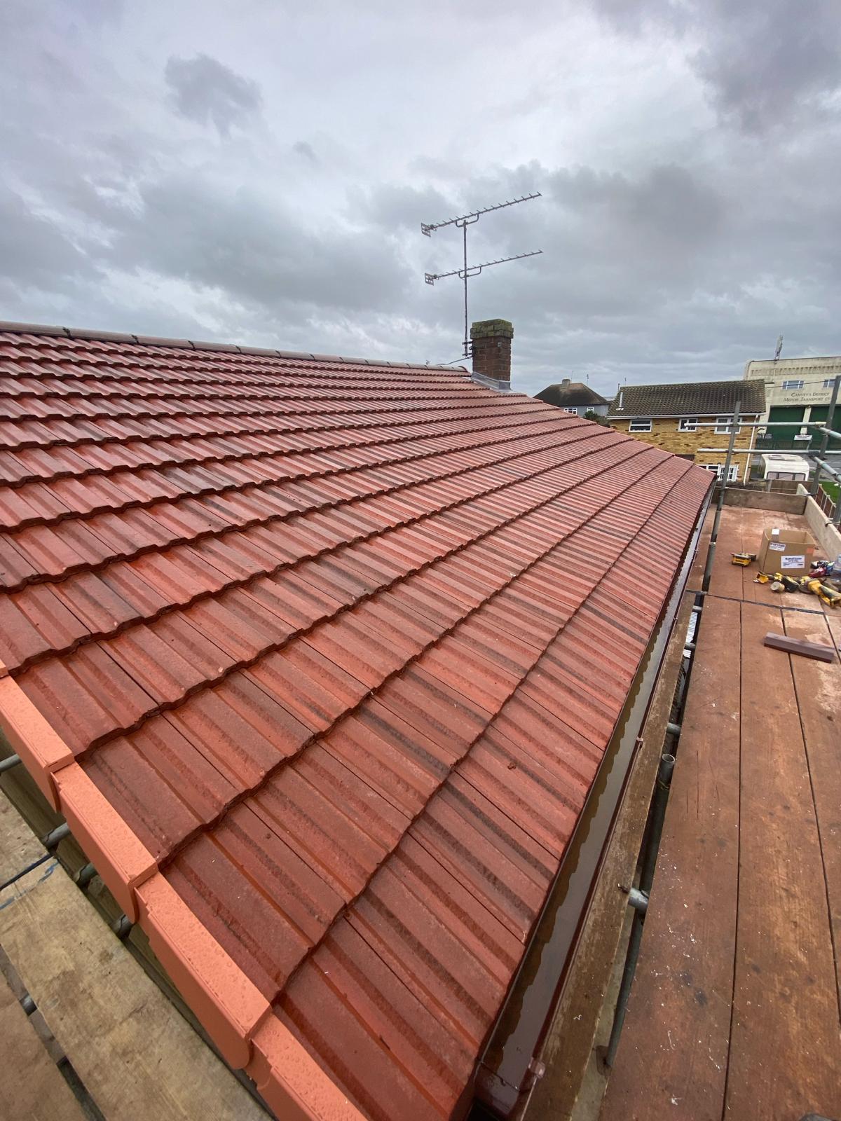 Red tiled re-roof finished by The Colchester Roofer